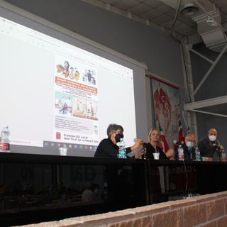 convegno Cgil con relatori al tavolo