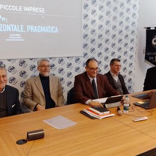foto di archivio e conferenza cna
