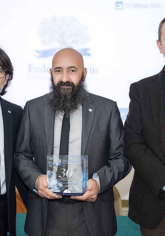 Domenico Iellamo (al centro) con Alessandro Franco (a sinistra) e Nicola Patrizi