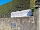 Lo striscione esposto davanti alla casa di riposo Bianchi di Cumiana