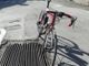 Bicicletta nella griglia in via Davico a Pinerolo