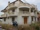 casa confiscata con agenti della Dia