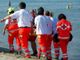 malore in spiaggia - foto di archivio