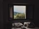 Finestra aperta con camera da letto