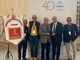 Il riconoscimento a Giulio Brarda, al centro della foto
