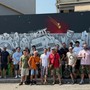 Nichelino, pulito e restituito a nuova vita il murale della pace vandalizzato